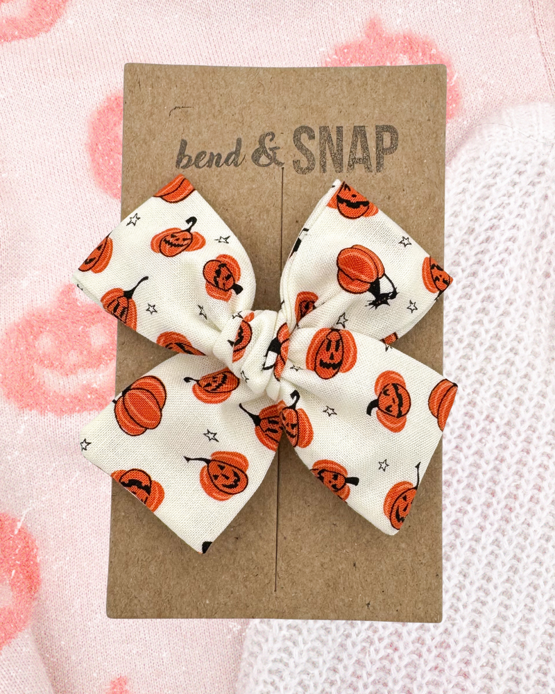 Pumpkins on Ivory // Hand-Tied